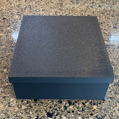 A black colored pencil storage caddy